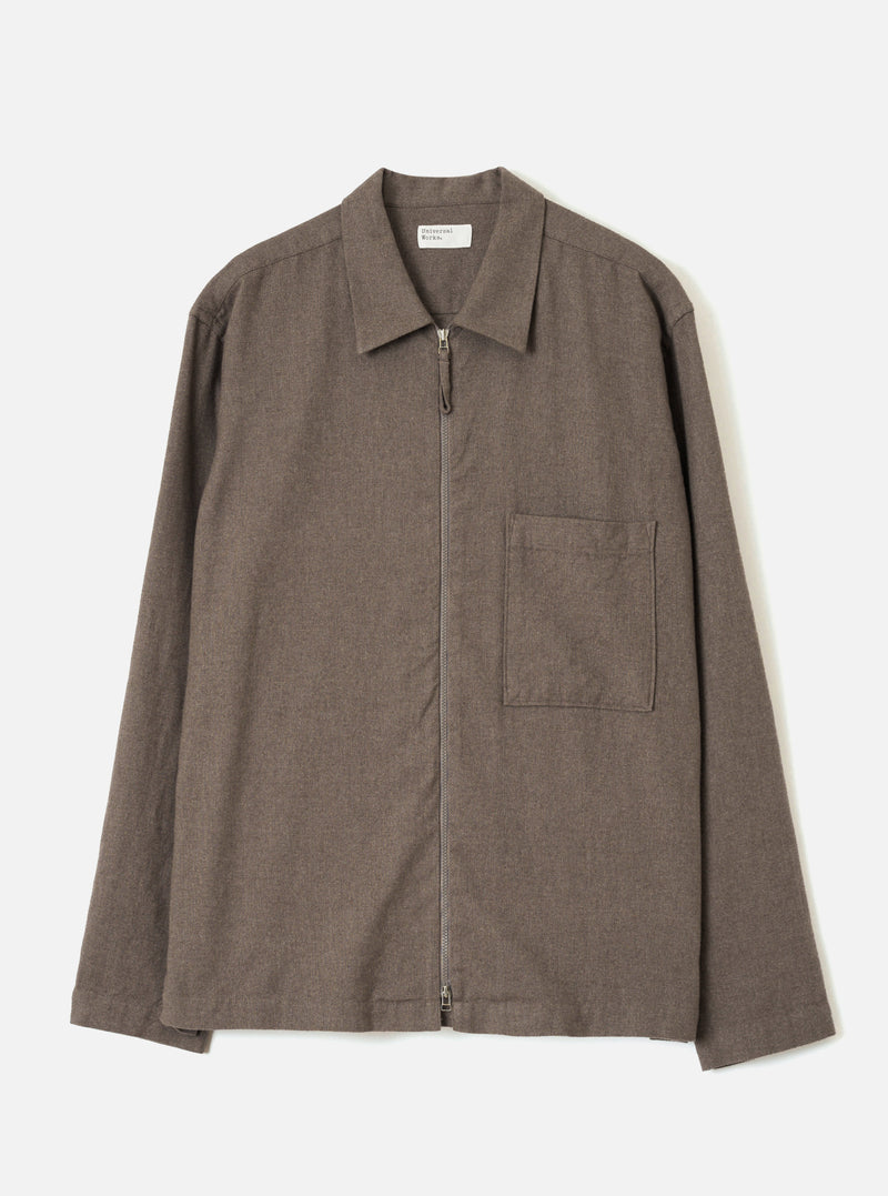 Front view of the Brown Monty Cotton Tencel Zip Shirt displayed against a plain white background. The studio shot emphasizes the full zip front, flat collar, chest pocket, and smooth brown fabric.