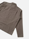 Back view of the Brown Monty Cotton Tencel Zip Shirt set against a clean, plain white background. The image shows the smooth back panel, clean shoulder seams, and straight hem of the brown garment.