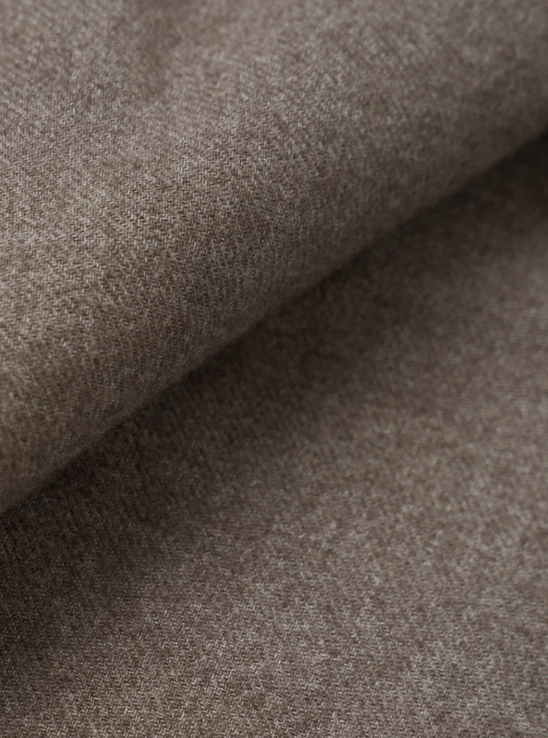 A close-up fabric swatch view filling the entire frame to demonstrate the rich texture, fine weave, and deep brown color of the material used in the Brown Monty Cotton Tencel Zip Shirt.