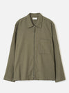 Front view of the Olive Monty Cotton Tencel Zip Shirt displayed flat against a plain off-white background, featuring the classic collar, zip front closure, chest pocket, and relaxed fit.