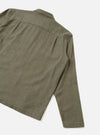 A clear back view of the Olive Monty Cotton Tencel Zip Shirt set against a plain white studio background, highlighting the smooth back panel, shoulder seams, and straight hem construction.