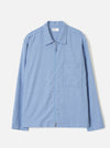 A front view of the Sky Blue Monty Cotton Tencel Zip Shirt against a plain off-white studio background, showcasing the neat collar, front zip closure, chest pocket, and light blue tone.