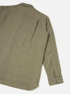 A back view of the Olive Monty Cotton Tencel Standard Shirt set against a clean white studio background, displaying the rear shoulder yoke, subtle pleat detail, and straight hem finish.
