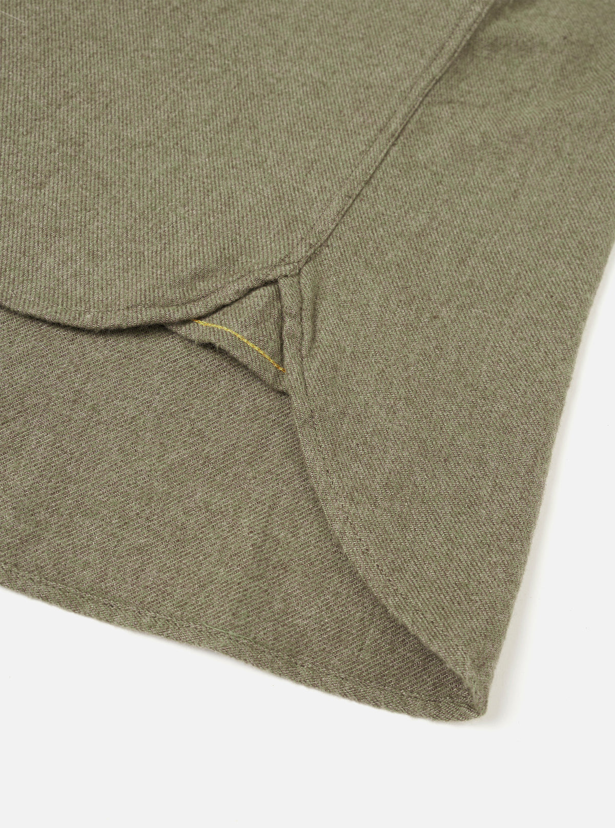 An additional detailed product shot of the Olive Monty Cotton Tencel Standard Shirt on a plain off-white background, showcasing fabric drape, pocket construction, and seam lines.