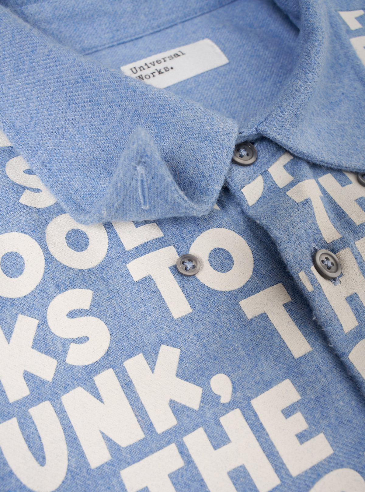 Front view of the Sky Blue Monty Cotton Tencel Standard Shirt displayed against a plain off-white studio background. The image showcases the classic collar, front button placket, chest pocket, and lightweight texture.