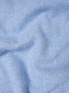 A detailed close-up fabric swatch image showing the soft texture and subtle weave of the Sky Blue Monty Cotton Tencel Standard Shirt. The shot fills the frame to highlight the light blue material quality.
