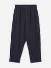 Front view of the Dark Navy Robin Wool Mix Pleated Track Pant presented on a white background, displaying the elasticated drawstring waist, single front pleat, and tapered leg design.