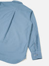 Back view of the Mid Blue R.Oxford Lazy Day Shirt shown against a plain studio background, detailing the clean shoulders, structured back yoke, and box pleat for comfortable, easy movement.