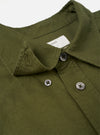 A full-length shot of a male model wearing the Olive R.Oxford Lazy Day Shirt paired with casual trousers against a studio background, illustrating the versatile smart-casual aesthetic.