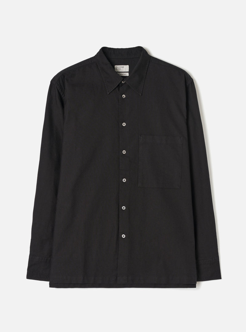 Front view of the Black R.Oxford Lucky Shirt displayed against a clean off-white background, featuring a two-piece collar, large square chest pocket, full button front, and straight hem.