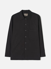 Front view of the Black Slub Shirting Fatigue Shirt shown against a plain white background. The image showcases the front chest pockets, button closures, neat collar, and relaxed fit of the black slub cotton fabric garment.