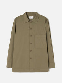 Front view of the Olive Slub Shirting Fatigue Shirt displayed against a clean off-white background. The shot details the dual chest pockets, front button placket, folded collar, and olive green slub cotton construction.