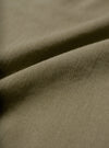 A macro fabric swatch image showing the fine weave and soft slub texture of the Olive Slub Shirting Fatigue Shirt. The close-up view fills the frame to display the distinct olive green shade and cotton material structure.