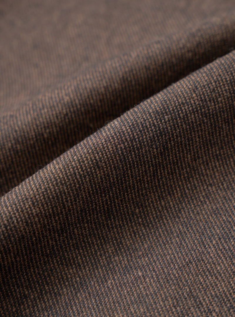 A detailed close-up fabric swatch image of the Brown Recycled Italian Tweed Military Chino on a plain white background, showing the woven texture and intricate speckles of the recycled wool blend yarn.