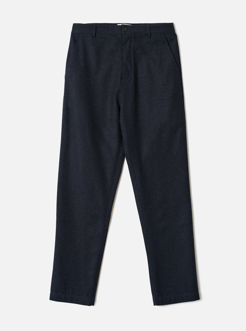 A full-length front view of a model wearing the Navy Recycled Italian Tweed Military Chino in a clean studio setting. The image showcases the trousers' slim straight fit, front waist details, and deep navy tweed fabric.