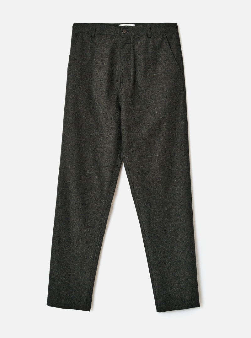 A full-length front view of a model wearing the Olive Recycled Italian Tweed Military Chino in a studio setting. The photograph showcases the straight fit, button waist, and textured olive green tweed fabric.