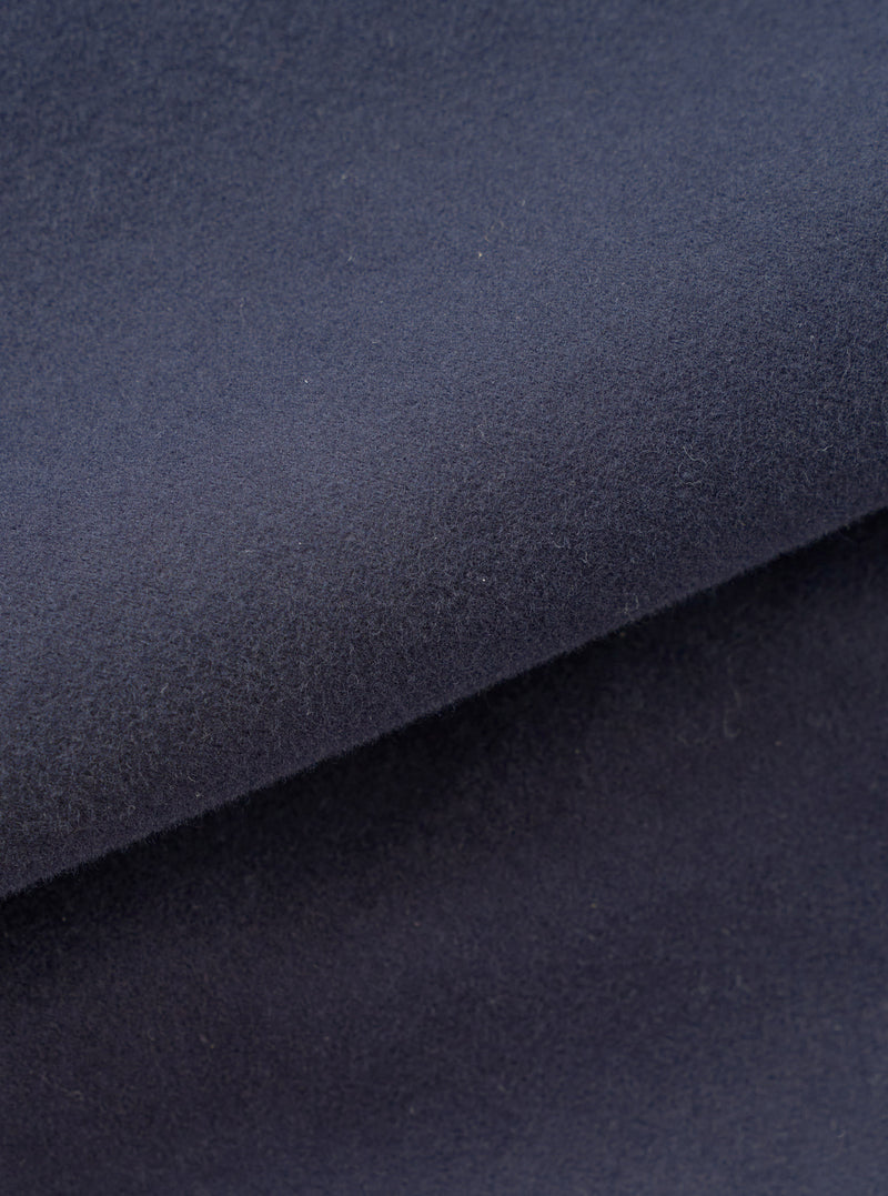 A close-up fabric swatch image showcasing the dark blue texture of the Navy Comfort Moleskin Ives Jacket against a white background, highlighting the soft brushed surface of the pure cotton moleskin weave.
