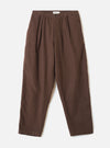 A full front product view of the Brown Comfort Moleskin Pleated Track Pant set against a plain white studio background, showcasing the relaxed loose fit, single pleat front, and elasticated drawstring waist.