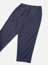A back view product image of the Navy Comfort Moleskin Pleated Track Pant against a plain white background, highlighting the rear buttoned flap pocket, clean stitching, and dark navy brushed cotton moleskin fabric.