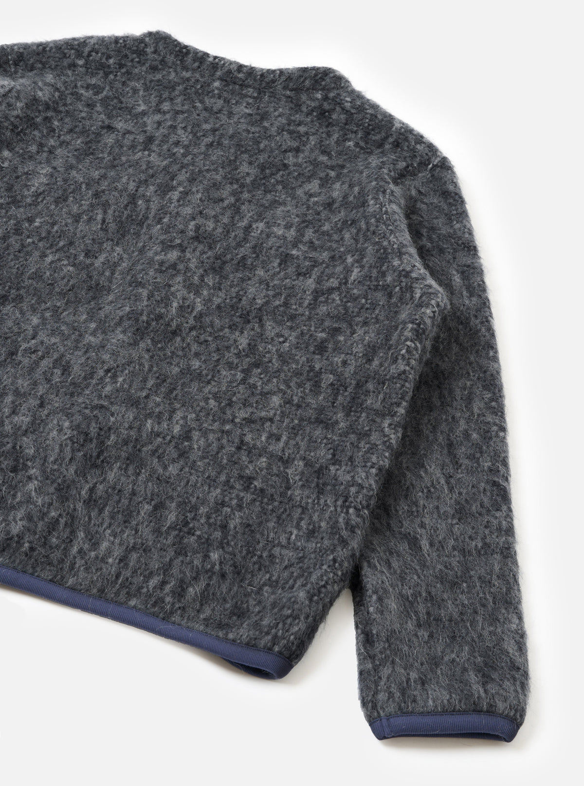A back view of a model wearing the Navy/Pale Grey Losso Mohair Mix Cardigan against a plain neutral background, showcasing the fit, knit texture, soft mohair blend finish, and overall back silhouette of the piece.