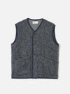 A full-length front view of a model wearing the Navy/Pale Grey Losso Mohair Mix Lancaster Gilet in a studio setting, showcasing its sleeveless design, front button closure, textured knit material, and relaxed fit.
