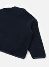 Rear view of the Navy Artic Fleece Hep Mountain Jacket laid out against a plain light background, highlighting the clean back panel construction, soft fleece texture, and durable hem finish.