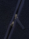 Detailed close-up image of the Navy Artic Fleece Hep Mountain Jacket on a white background, emphasizing the front zipper hardware, fleece texture, chest pocket detail, and collar stitching.