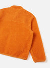 Back view of the Orange Artic Fleece Hep Mountain Jacket set against a clean white backdrop, detailing the seamless shoulder construction, soft fleece texture, and bright orange finish.