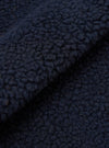 A close-up swatch image showcasing the dark navy fabric texture of the Navy Artic Fleece Hep Mountain Gilet on a solid white background, emphasizing the soft fleece pile and rich recycled wool fiber mix.