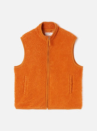 A full-length front view of a model wearing the Orange Artic Fleece Hep Mountain Gilet in a studio set with a neutral background. The photo highlights the vibrant orange fleece, zip front, and sleeveless gilet cut.