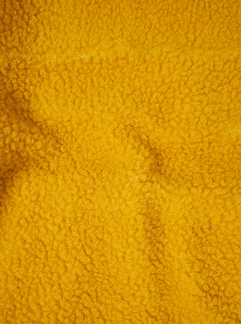 A close-up swatch image displaying the bright yellow fabric texture of the Yellow Artic Fleece Hep Mountain Gilet on a white background, emphasizing the recycled fleece pile and wool yarn blend.