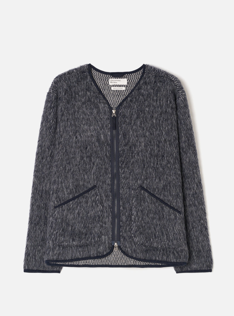 A full-length front view of a model wearing the Navy/Pale Grey Losso Mohair Mix Zip Liner Jacket in a bright studio backdrop. The shot showcases the zip front, collar, and patterned navy and grey mohair fabric.