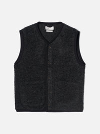 Charcoal boucle style fleece gilet laid flat on a light grey studio backdrop. V-neckline and armhole edges finished with black ribbed binding. Five dark buttons run down the centre front. Two patch pockets sit at the hem. A Universal Works woven label is visible at the inner neck.