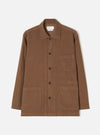Full front product view of the Brown Fine Cord Bakers Overshirt against a plain white background. The image displays the pointed collar, front button closure, multiple functional pockets, and rich brown fine corduroy.