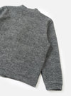 A full-length back view of a model wearing the Grey Marl Wool Mix Knit Advance Cardigan against a light background, highlighting the garment's comfortable fit, clean hemline, and textured grey marl fleece.