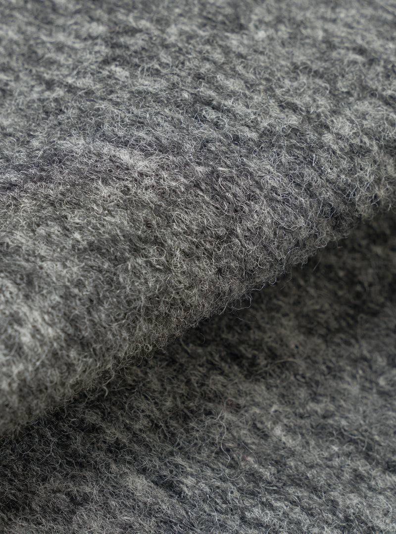 A close-up fabric swatch photograph of the Grey Marl Wool Mix Knit Advance Cardigan set against a white backdrop, displaying the intricate grey marl knit pattern and soft wool blend yarn texture.