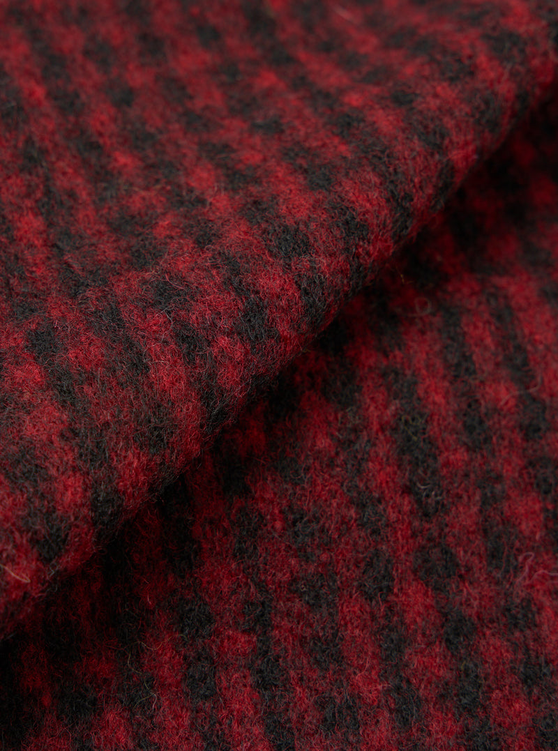 A detailed close-up fabric swatch image of the Black/Red 533 Wool Mix Cardigan on a white background, highlighting the distinct black and red woven pattern and rich texture of the wool mix fleece.
