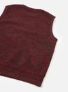 A full-length back view of a model wearing the Black/Red 533 Wool Mix Giacomo Tank Top against a neutral studio background, showing the sleeveless silhouette and back pattern of the wool mix vest.