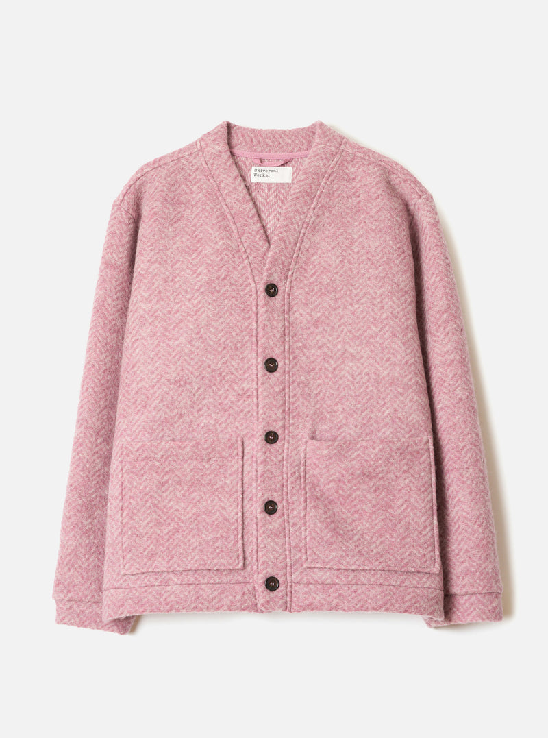A front view photograph of the Pink Raven Fleece Advance Cardigan displayed against a white background, highlighting its V-neck front, tonal buttons, patch pockets, and vibrant pink wool fleece material.