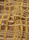 A detailed close-up swatch photograph showing the rich texture and fuzzy surface of the wool-blend fleece fabric on the Brown Duomo Fleece Cardigan against a plain white background.