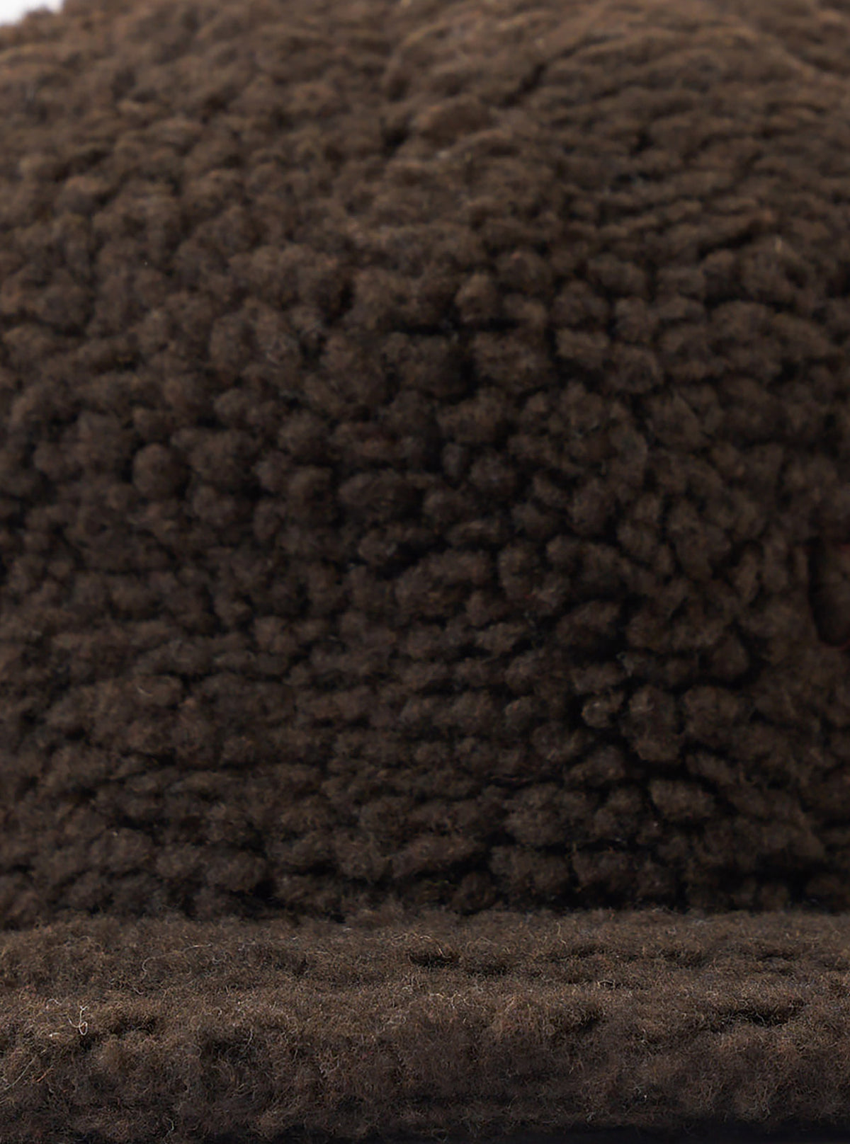 A back view of the Brown Galaxy Fleece Baseball Hat displayed on a plain neutral background, showcasing the adjustable back strap with metal buckle and clean rear panel construction.
