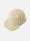 A side view shot of the Ecru Galaxy Fleece Baseball Hat on a neutral studio background, showcasing the crown shape, ventilation eyelets, and textured cream-colored fleece material.