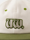 A back view image of the Ecru/Olive Canvas Baseball Hat on a neutral white background. The key focus is the adjustable brown leather strap with a metal clasp and embroidered branding near the rear panel.