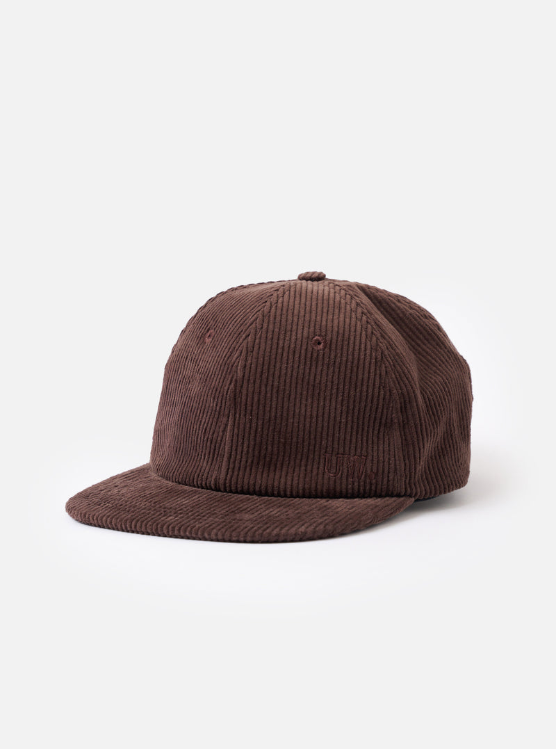 A front-facing view of the Cacao Cord Baseball Hat presented on a plain white background. The image features the six-panel rich brown corduroy crown, a curved matching peak, and clean panel stitching.
