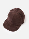 A side profile view of the Cacao Cord Baseball Hat shown against a white background. The photo highlights the ribbed corduroy texture, ventilation eyelet, and structured crown curve of the brown cap.
