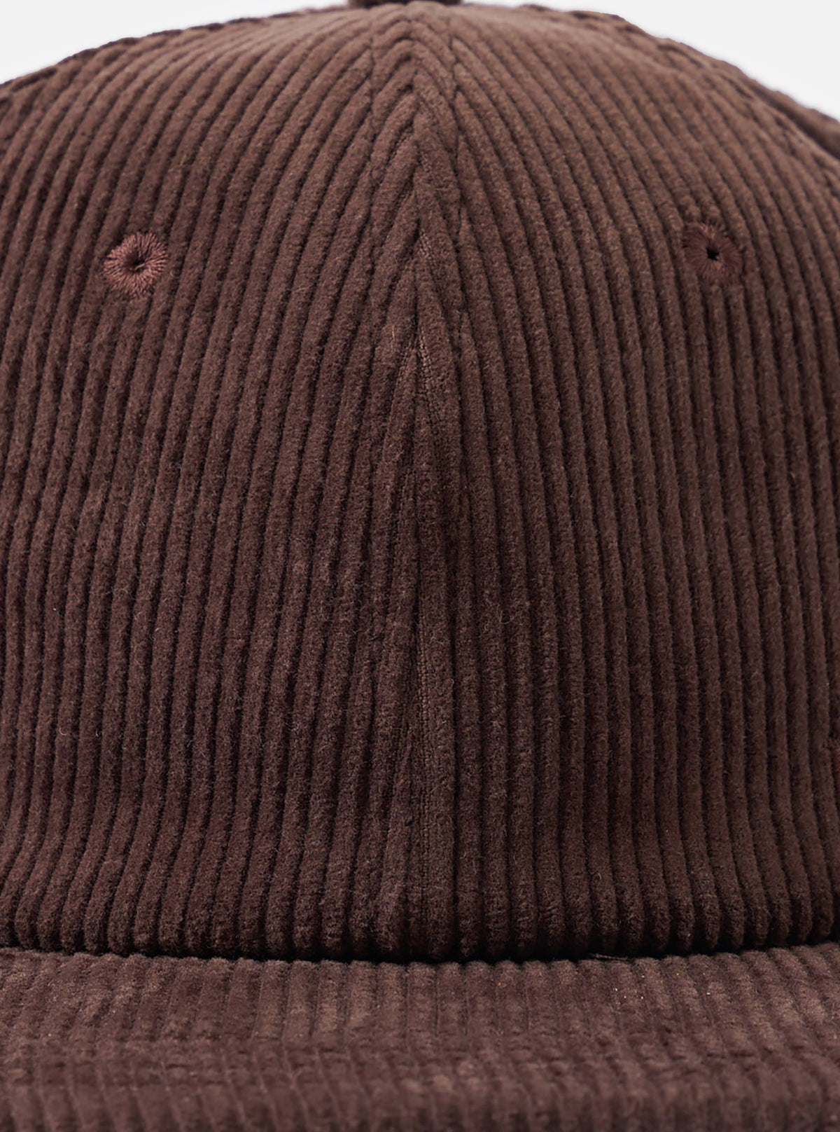 A rear view image of the Cacao Cord Baseball Hat set on a plain white background. The shot focuses on the adjustable back closure strap with a metal buckle and the ribbed corduroy texture of the cap.
