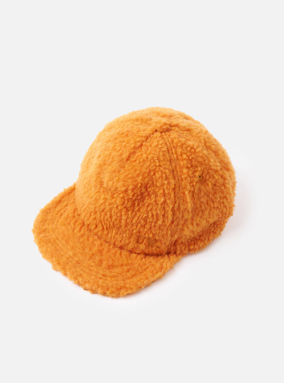 A side angle photograph of the Orange Artic Fleece Baseball Hat displayed against a clean white background, highlighting the thick textured fleece material, side paneling, and deep orange tone of the cap.