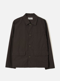A front studio view of the Brown Micro Canvas Warmus Jacket displayed against a plain white background, featuring a classic collar, button-up front, chest welt pocket, and lower patch pockets in rich brown cotton canvas.