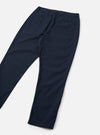 Rear view image of the Navy Micro Canvas Military Chino presented on a plain white studio background. The shot emphasizes the back welt pockets, clean seam details, waistband structure, and straight fit of the dark navy cotton trousers.