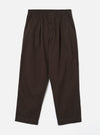 Front view image of the Brown Micro Canvas Oxford Pant on a neutral studio background. The shot highlights the relaxed wide-leg fit, front pleats, drawstring waist construction, and rich brown micro-canvas cotton fabric.